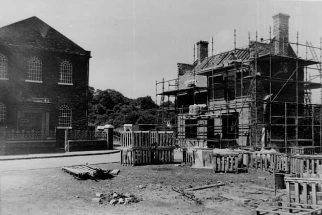 The Bottle and Glass pub as it was being built