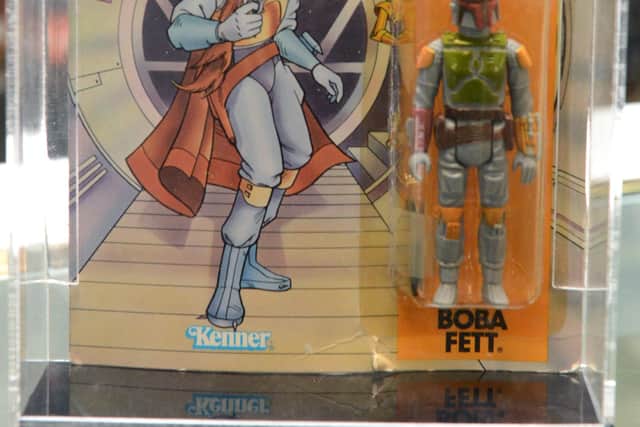 Droids Boba Fett. One of the Star Wars memorabelia that is expected to fetch around £1400