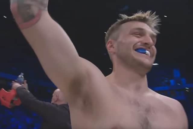 Jay waving to fans before the bout. 