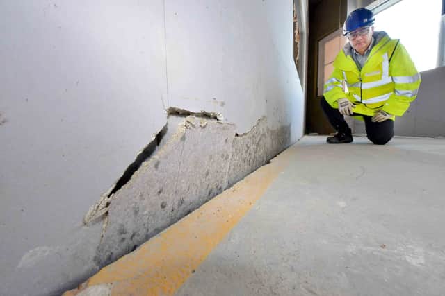 Rob Maiden shows mould on the plasterboard