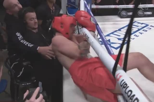 The second time Jay was pushed under the ropes during the fight