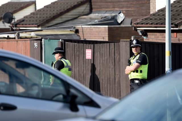 Police at the scene of the shooting