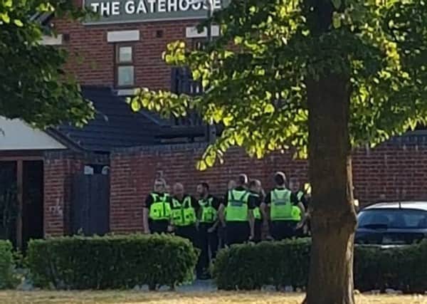 Police outside The Gatehouse pub following the gun attack earlier this month