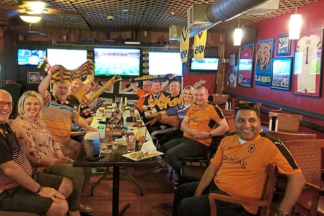 A meet up of Houston Wolves members during a game