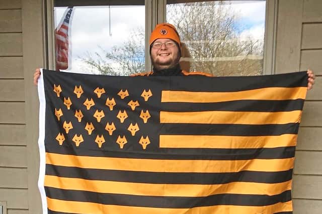 33-year-old Chris Wood, from Columbus in Ohio, with his American Wolves flag