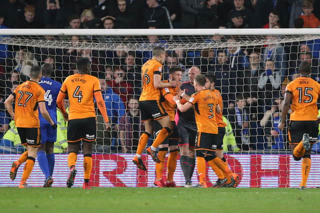 Ruddy is mobbed by his team mates