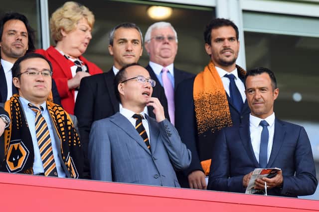 Left to right, Jeff Shi with Guo Guangchang, the chairman of Fosun International Limited, and agent Jorge Mendes at Molineux