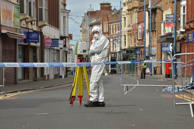 Police on Stourbridge High Street after Mr Passey's death