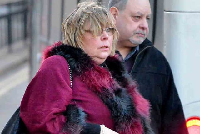 Megan's mum Dawn and father Martin outside court