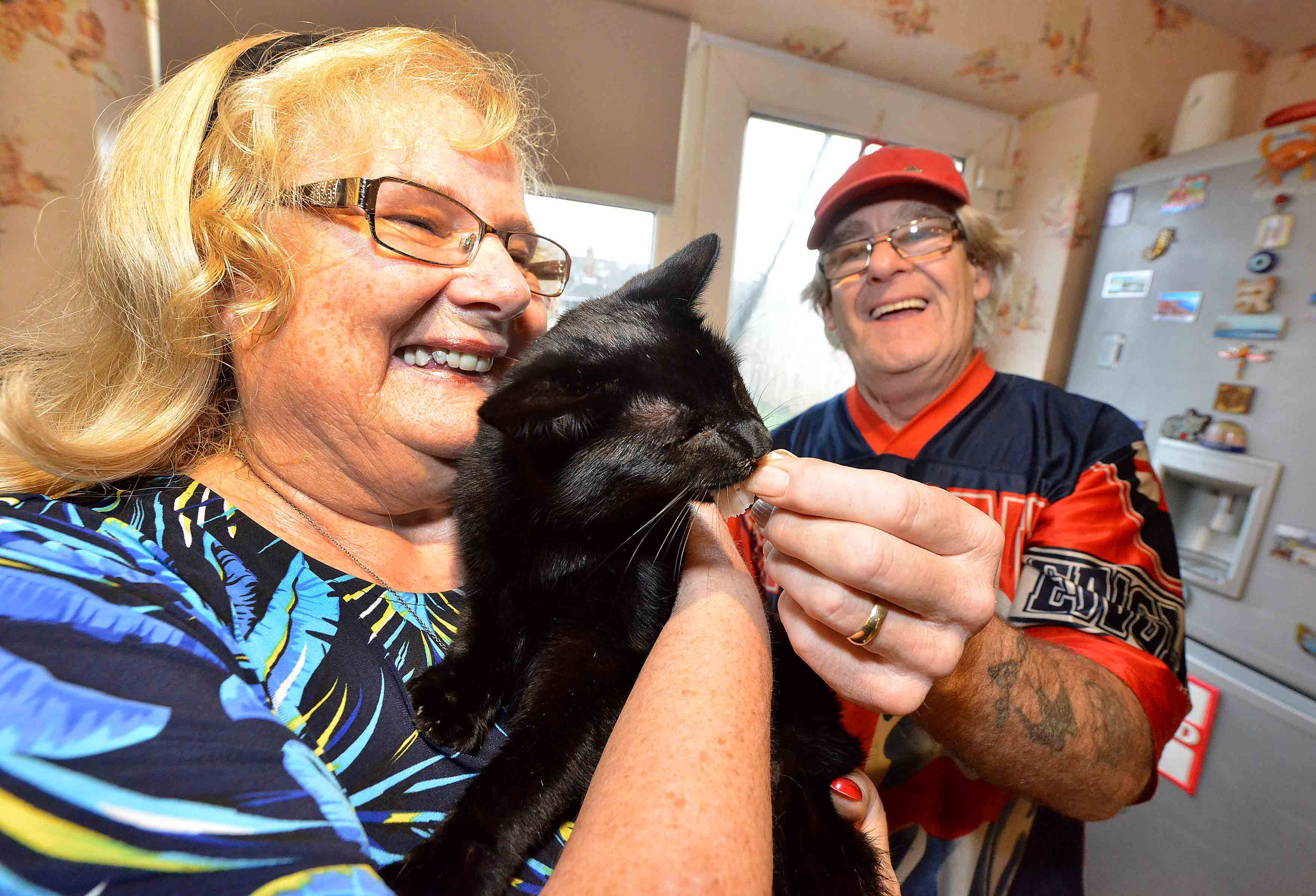Mrs Sutton and her husband with Tiggy