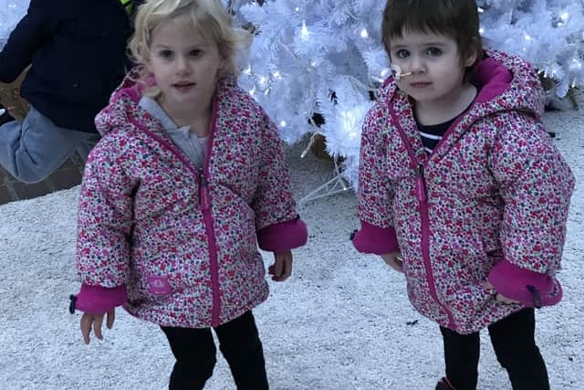 Isla with her twin sister Lottie and brother Finn