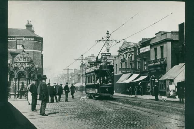 A tram on the high street in 1910