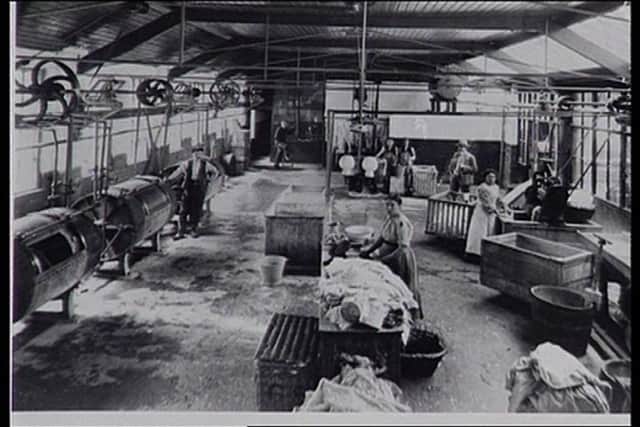 Stafford laundry, around the 1930s, as workers wash clothes and bedding