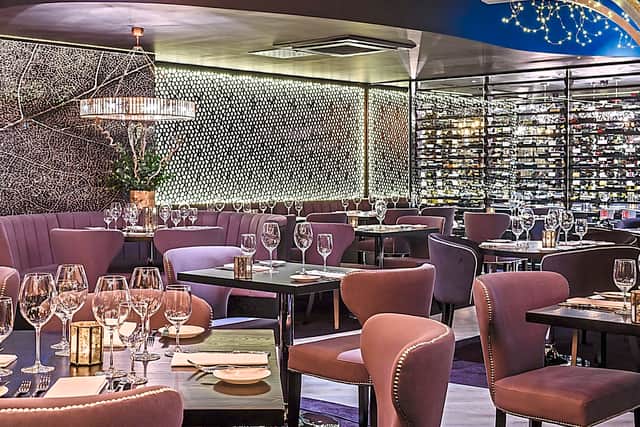 Inside is full of lights, mirrors and designer furnishings