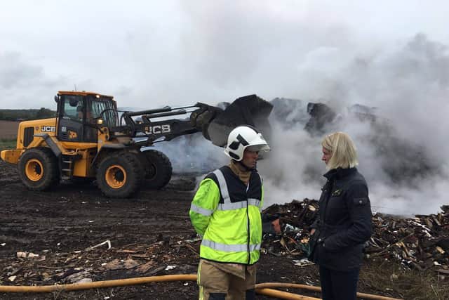 Amanda Milling talking to firefighters at Slitting Mill earlier this year.