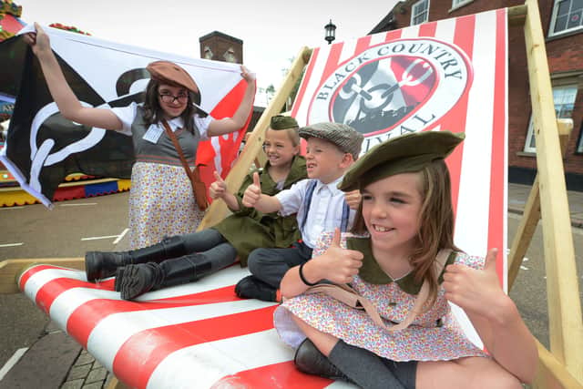 Enjoying the Dudley Fun Day, part of the Black Country Festival, Ashley Colley, 13, Demi-Leigh Mocroft, 10, Tyler Mocroft, 7, and Tegan Mocroft, 8.