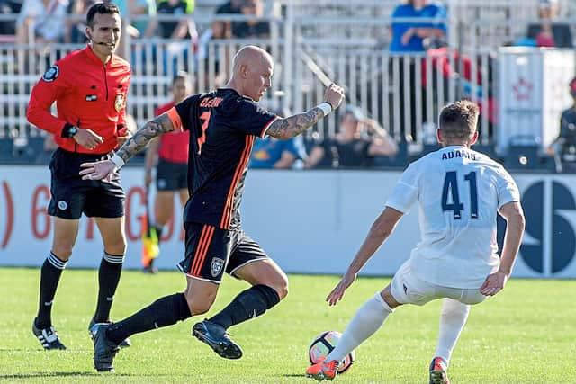 Richard Chaplow wearing the armband for Orange County Soccer Club.
