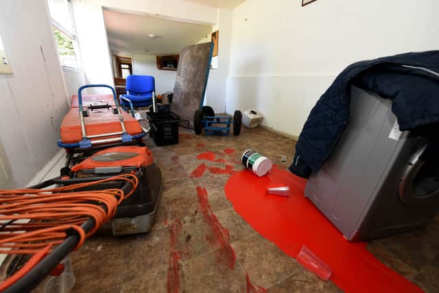 The trashed store room. 