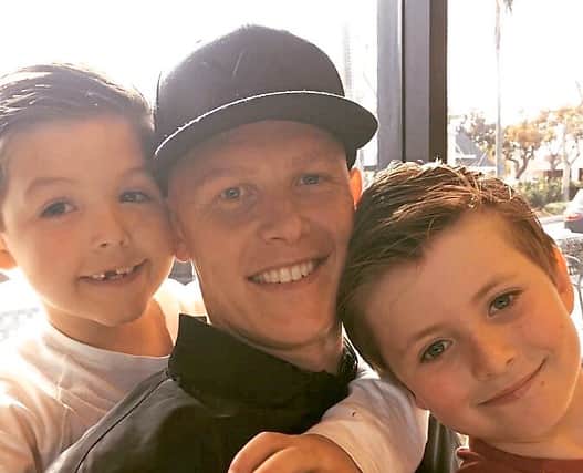 Chaplow with sons Elijah and Milo