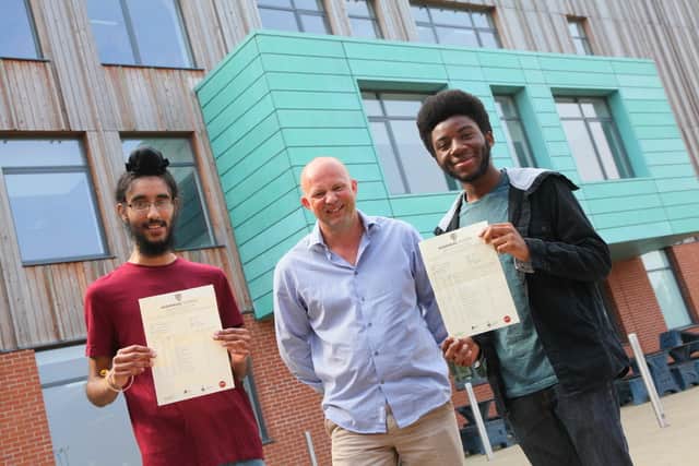 Brian, right, with headteacher Graham Tate and fellow pupil Hanvir Rai, who also got into Oxford