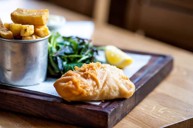 It’s a classic – fish and chips comes with crushed peas and tartare sauce