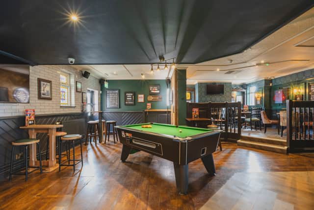 The pub has a new games area, including space for pool and darts