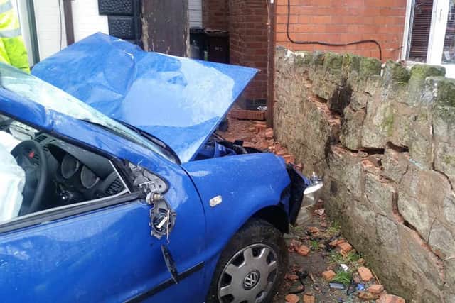 A wall outside one of the homes with damage after the crash. Picture: Wolverhampton Fire Station