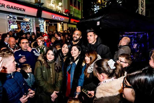 Carl Ikeme and Danny Batth with fans
