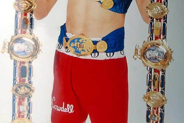 A young Pat Cowdell with his Lonsdale belts