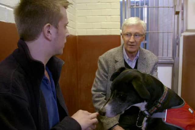 TV host Paul O'Grady, right, was desperate to help out
