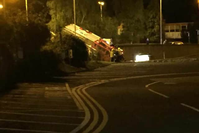 Five firefighters injured after FIRE ENGINE crashed through a wall on ...