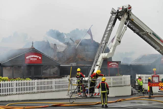 Damping down in the aftermath of the fire