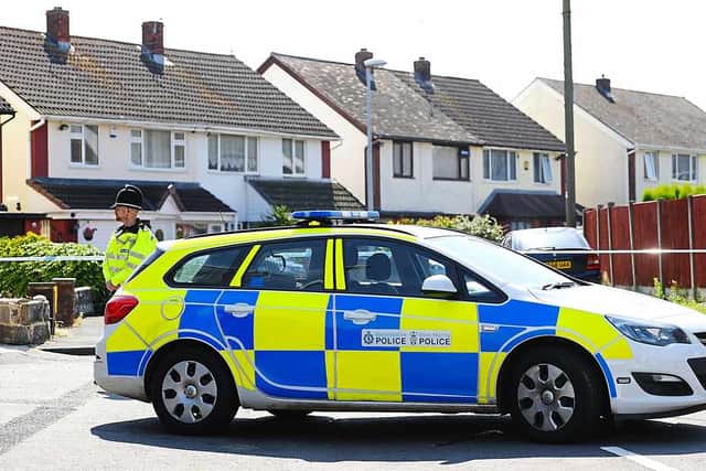 Police at the scene after Mr Atkinson was Tasered