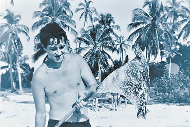 Spearing a stingray while serving in Belize in 1977