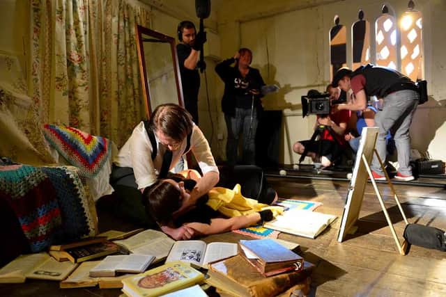 Actors Tom Loone and Sarah Gain during rehearsals