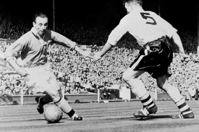 Sir Stanley Matthews at Wembley doing what he did best - dribbling with a football