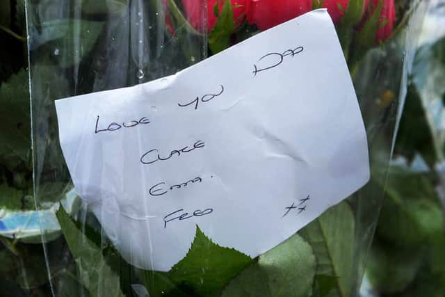 Flowers left outside the Queens Head pub