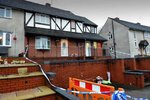 Police outside the Abbott's Lodge Crescent house