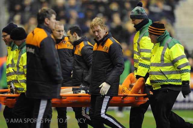 Jordan Graham leaves the filed on a stretcher