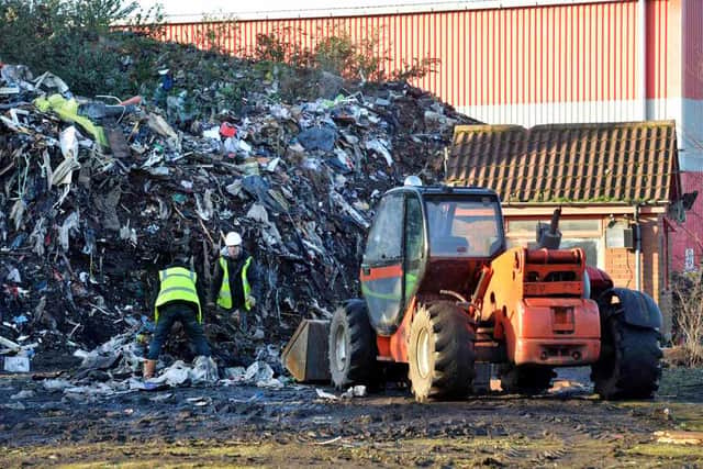 Work begins on the rubbish mountain