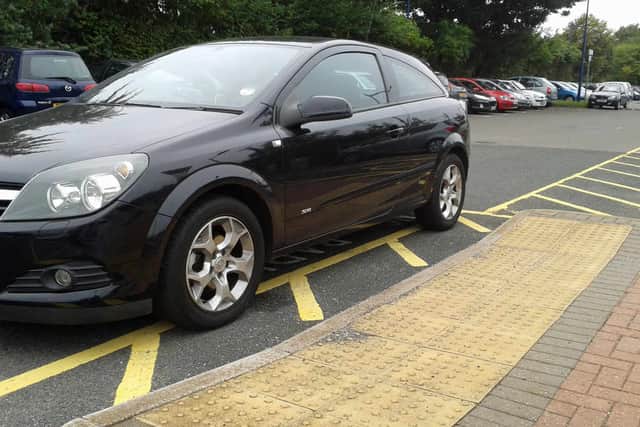 Parking over the lines