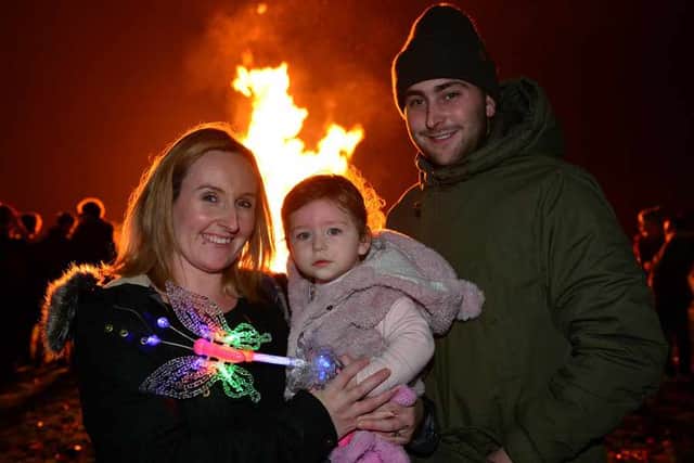 Natalie and Lewis Poole, both from Tipton, are pictured with daughter Harper, aged 1 at the fireworks display in West Bromwich