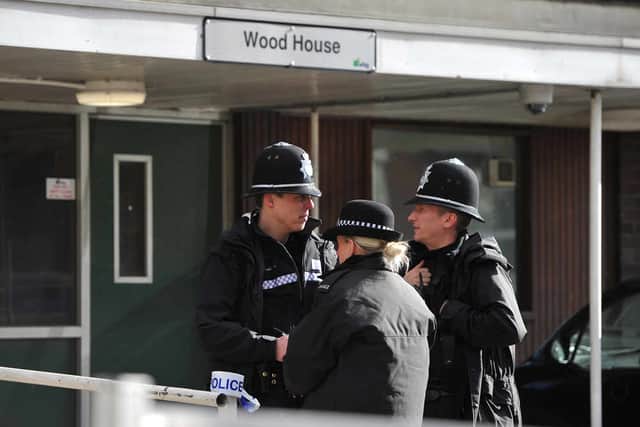 The scene at Wood House block of flats following the fall