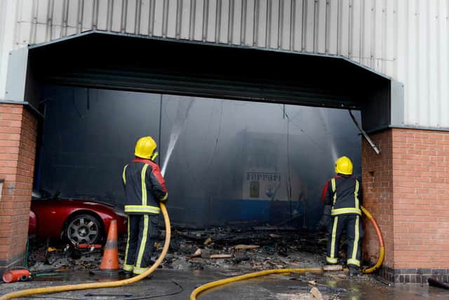 Fire crews at the garage on Plant Road