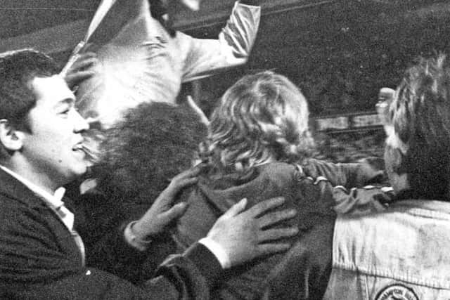 Hibbitt is chaired off the field after Wolves' 1980 League Cup semi final win over Swindon Town