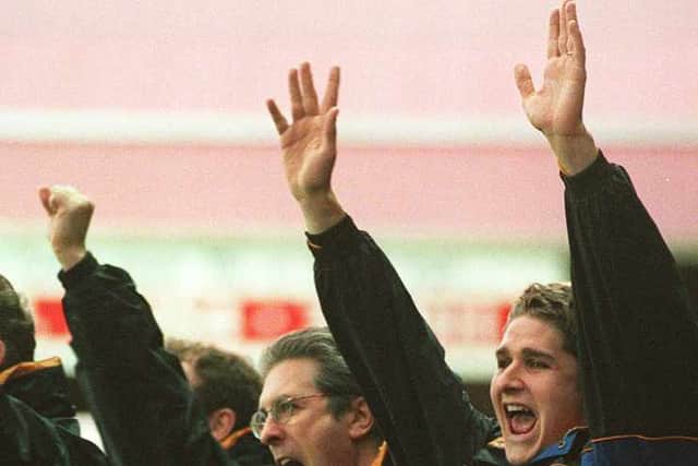 Colin Lee and substitute Carl Robinson celebrate Wolves' third goal at Ashton Gate