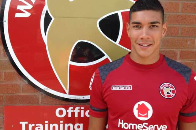 Neil Etheridge with his new club after signing for Walsall on a two-year contract.