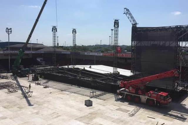 The stadium's pitch has disappeared beneath boards ready for the 14,000 fans