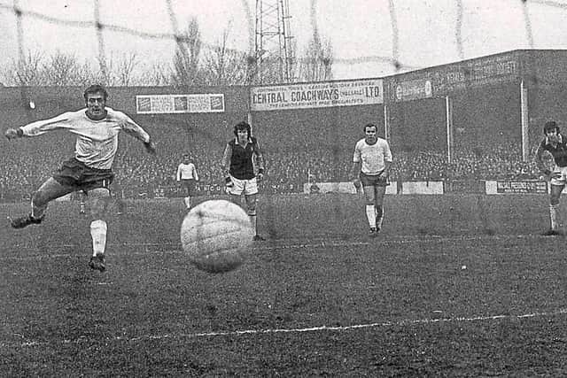 Colin 'Cannonball' Taylor scores a penalty against Villa during the Division Three clash at Fellows Park in 1971.