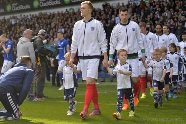 Darren Fletcher leads out Albion on Astle Day during his time at the club.